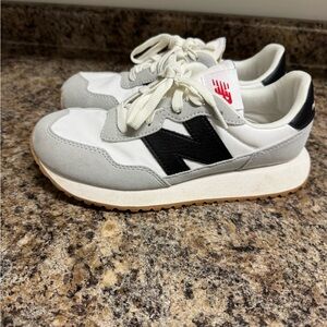 Youth New Balance White, Gray, and black Athletic Shoes
